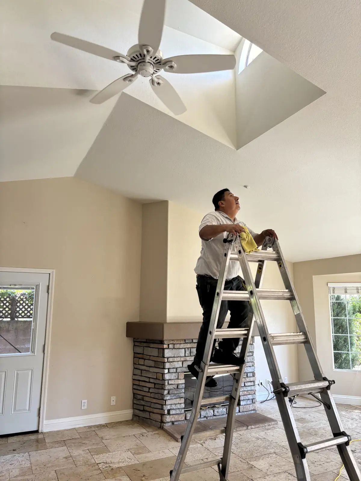 Cleaning a ceiling fan in a new home