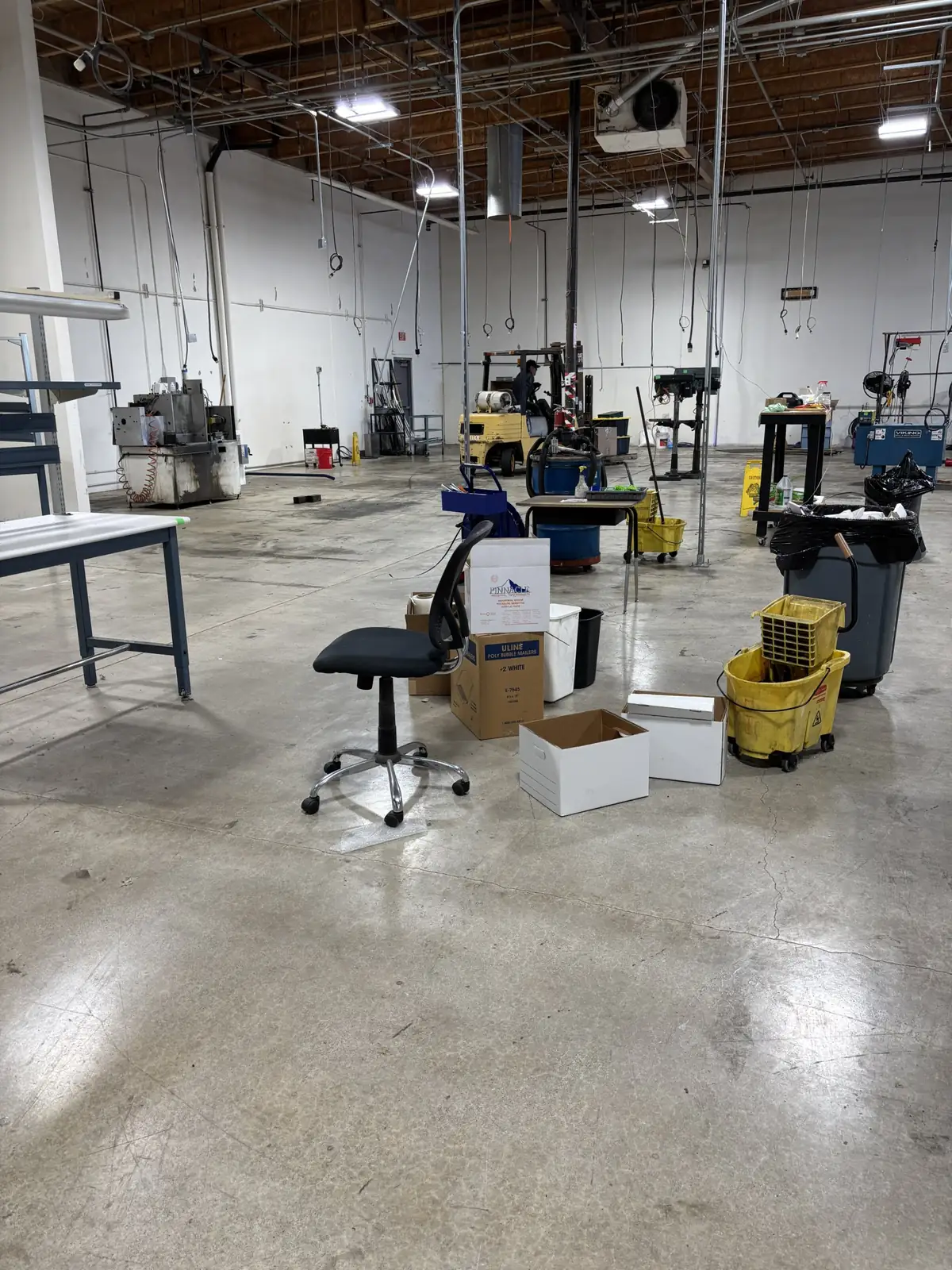 Warehouse floor before an industrial cleaning